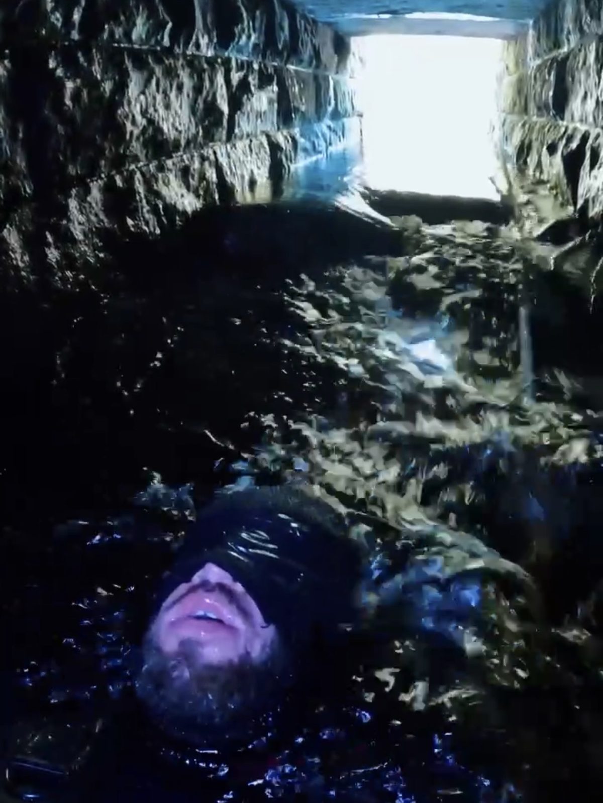 Inside the challenge, claustrophobic underground water tunnel